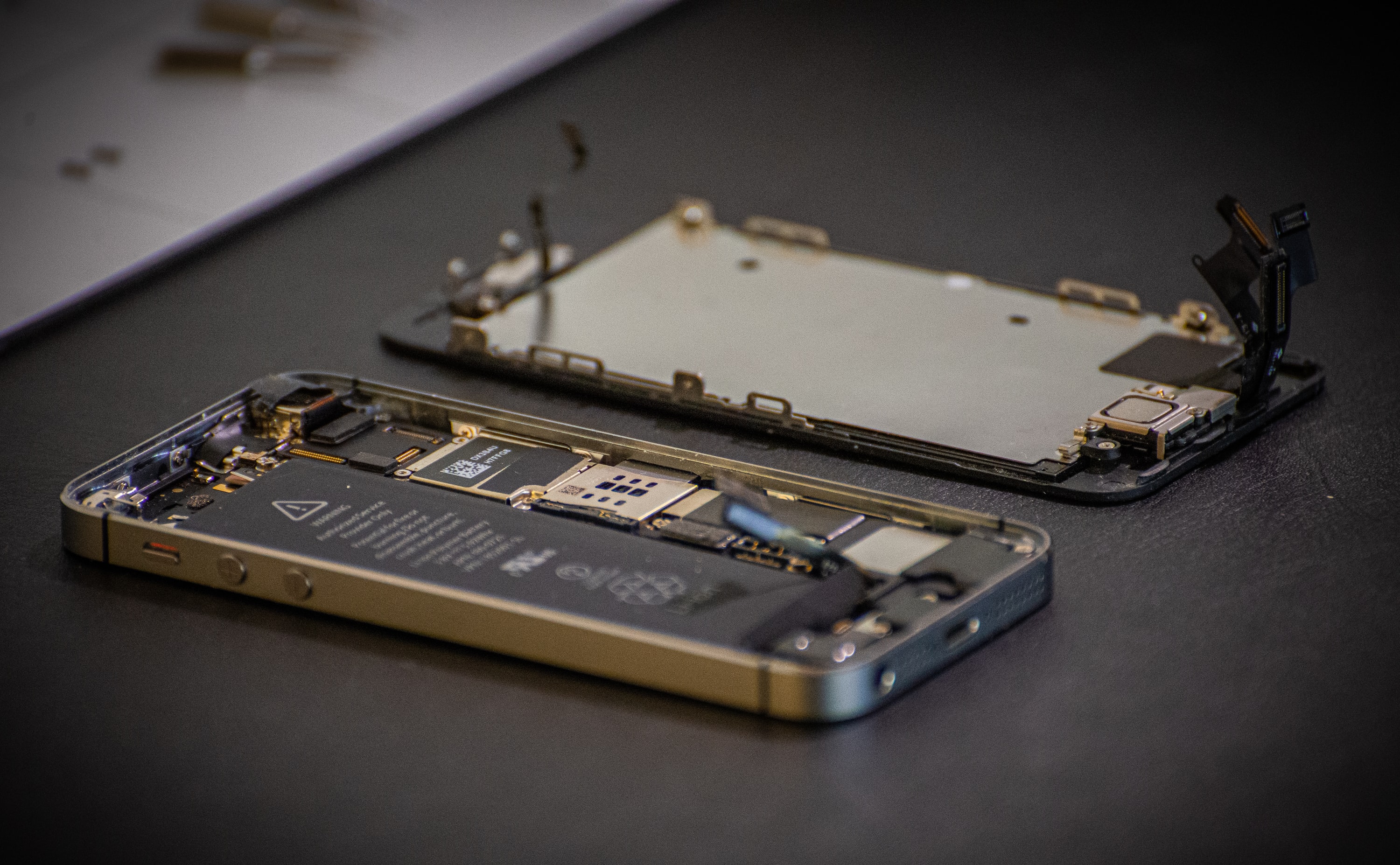 An iPhone under repair.